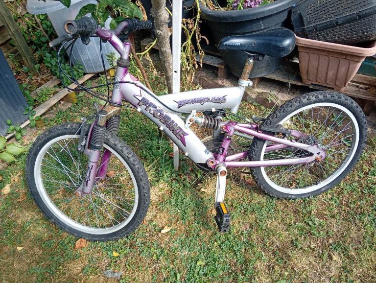 Pink/white bike for sale