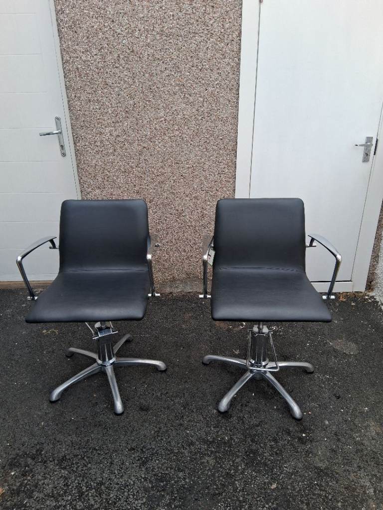 Two Black Swivel Chairs with Metal Base – Good Condition