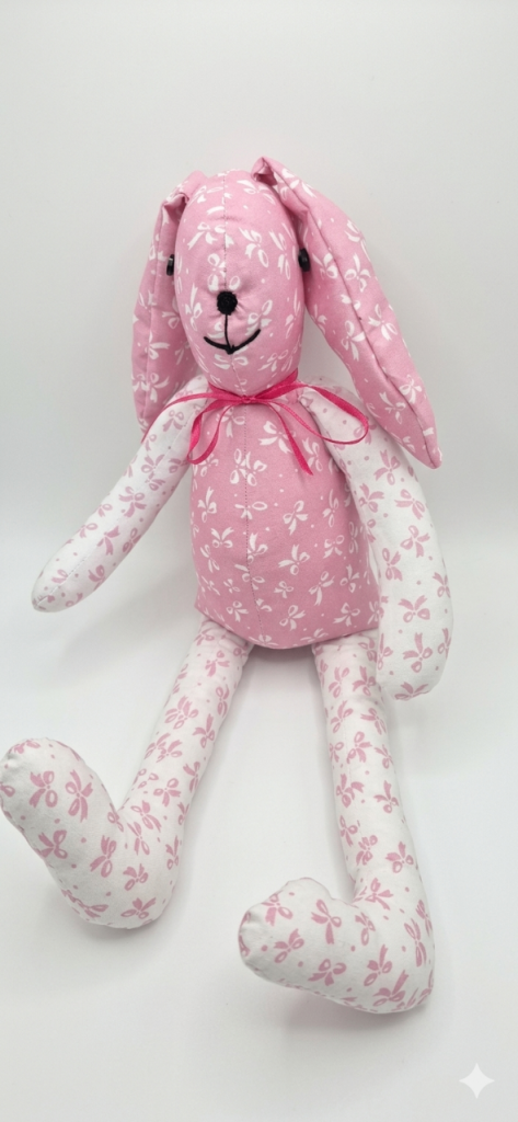 Childs pink plush rabbit 