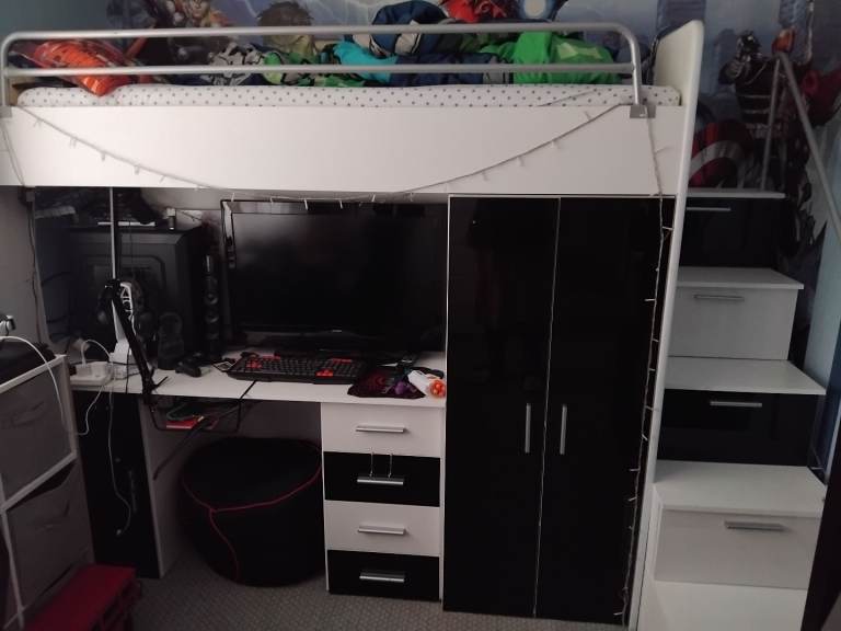Single loft bed with lots of storage 