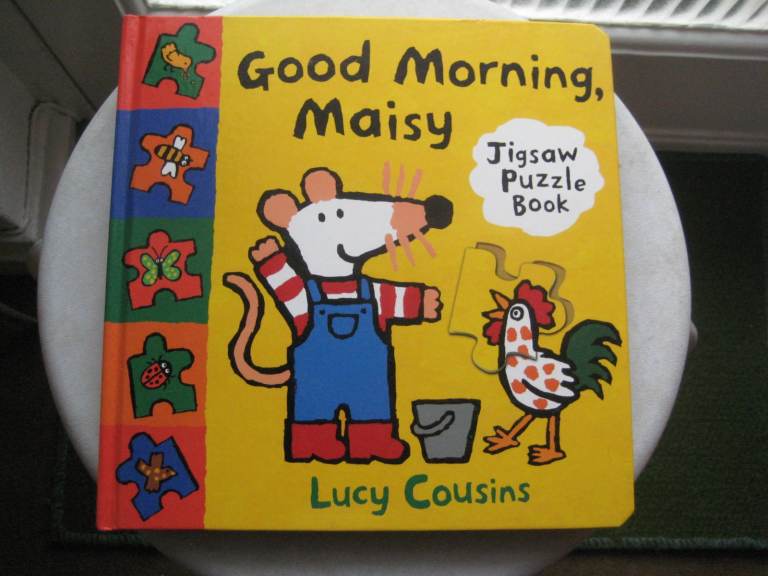 As New Good Morning Maisy by Lucy Cousins Hardboard Book with 7 Different Nine-Piece Jigsaws for £3