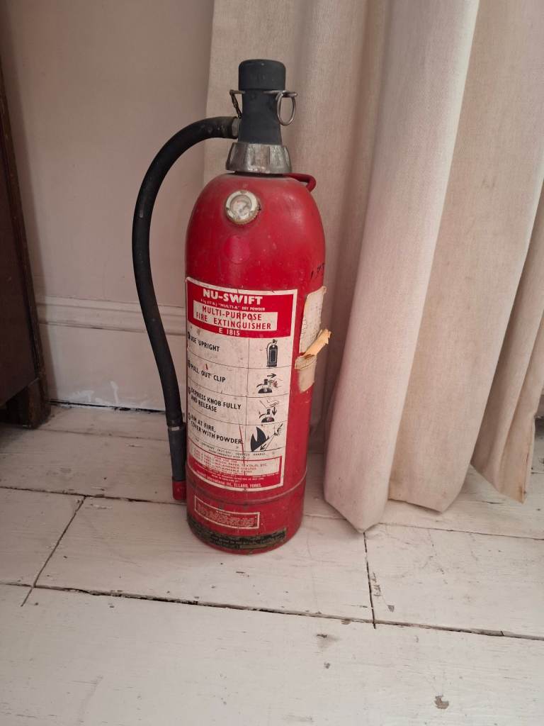 Vintage Fire Extinguisher NOT EMPTY nu-swift intl ltd 1971