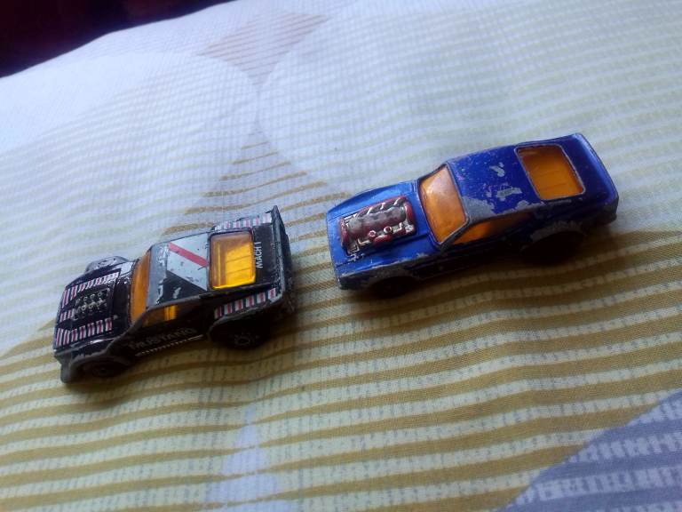 2 vintage very collectable metal toy cars 