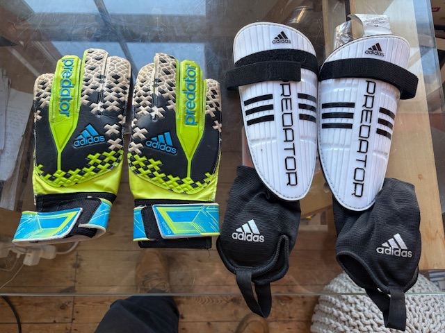 Adidas Predator football shin pads and goalkeeper gloves