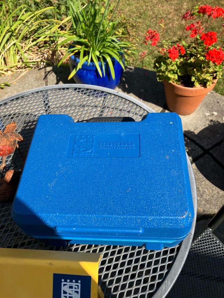 Stronghold hitch lock with storage box and 2 keys in good condition