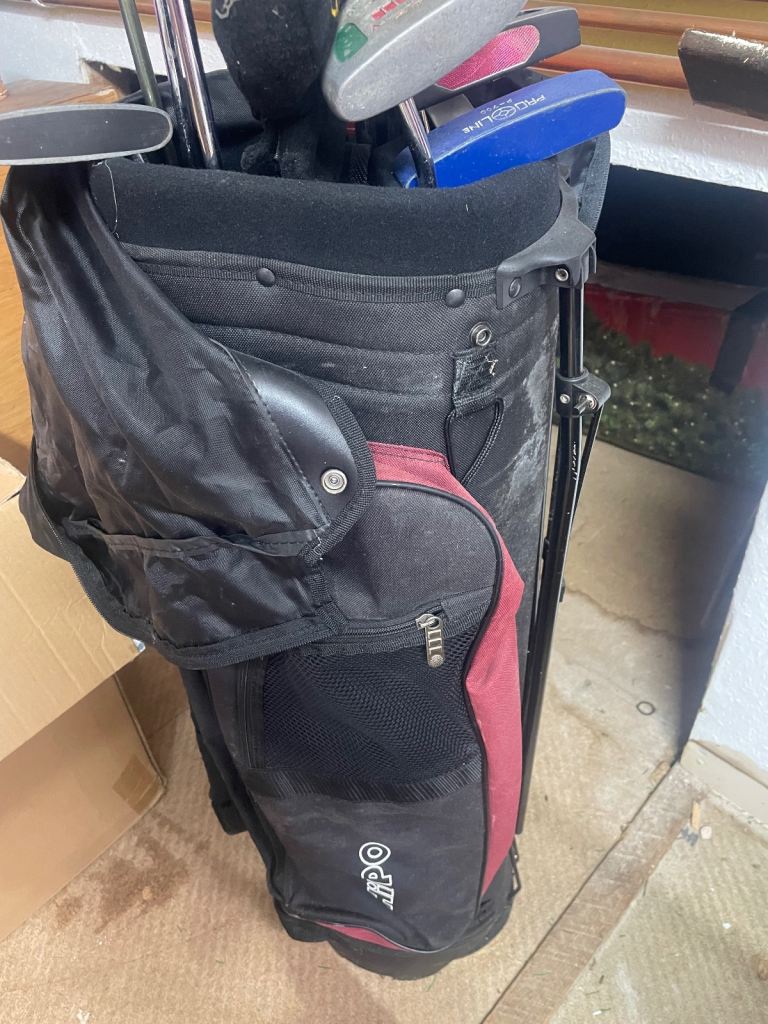 Golf bag and various clubs