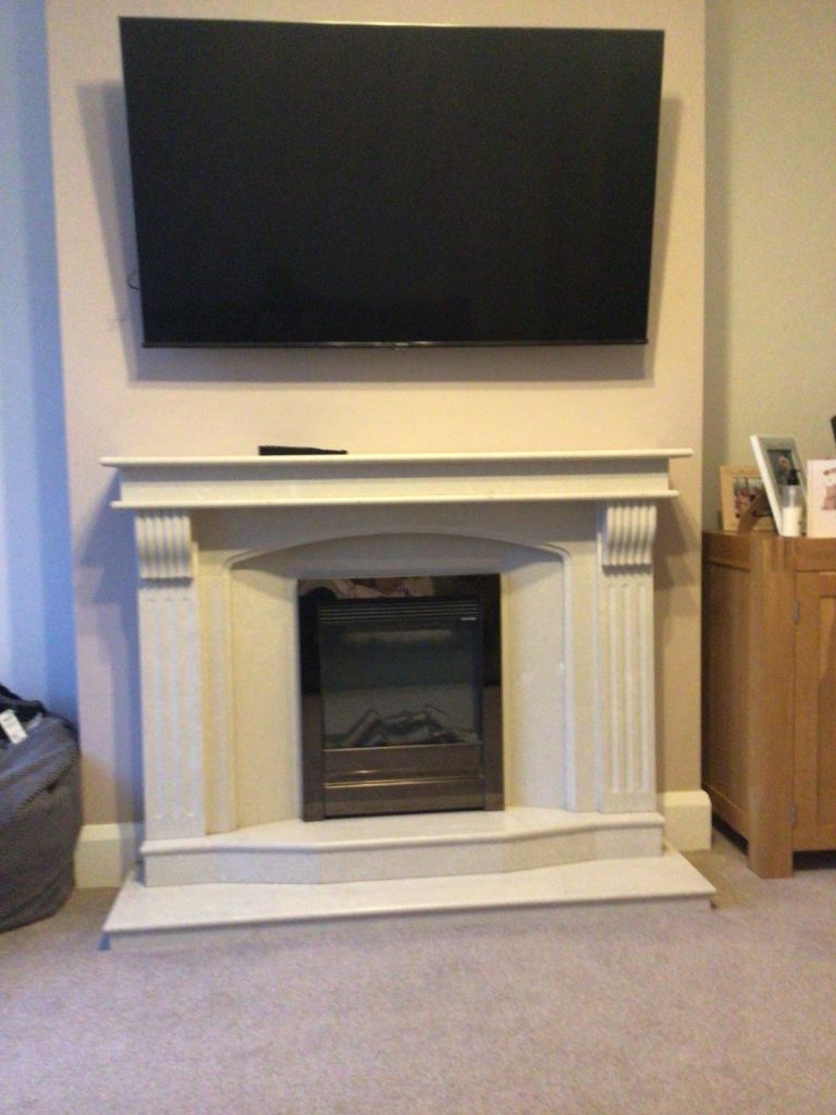 Marble fireplace and electric fire