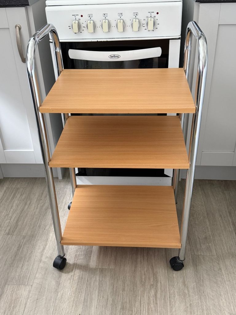 Three tiered shelving on wheels 14x17x33 inches