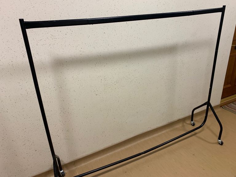 Black Metal Clothes Rail with Wheels – Good Condition