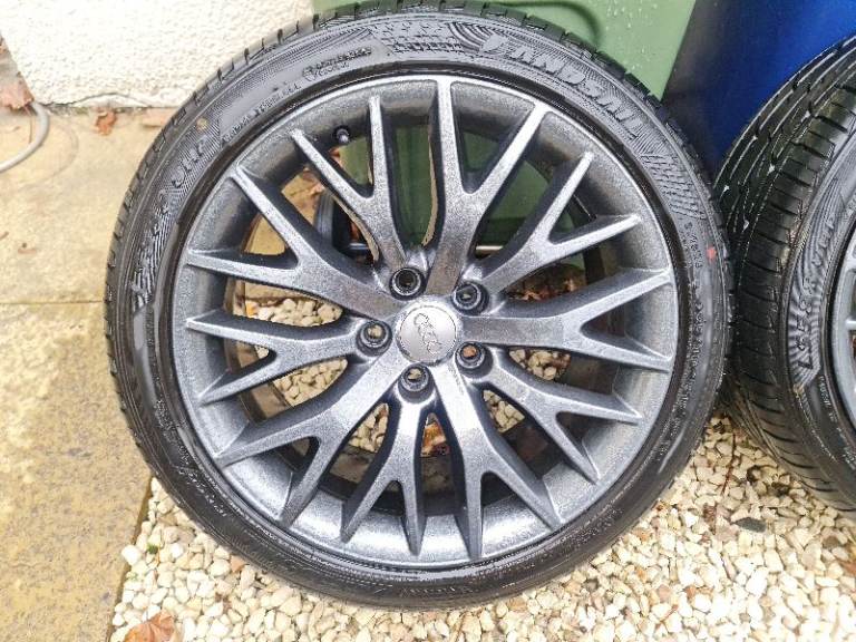 4 immaculate Audi A4 Convertible  18" Y spoke alloys with unused new tyres and new Audi Centre caps