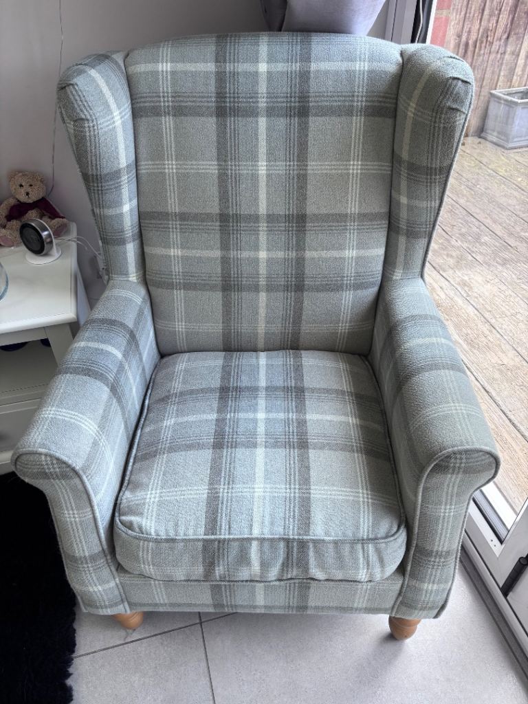 Winged back armchair