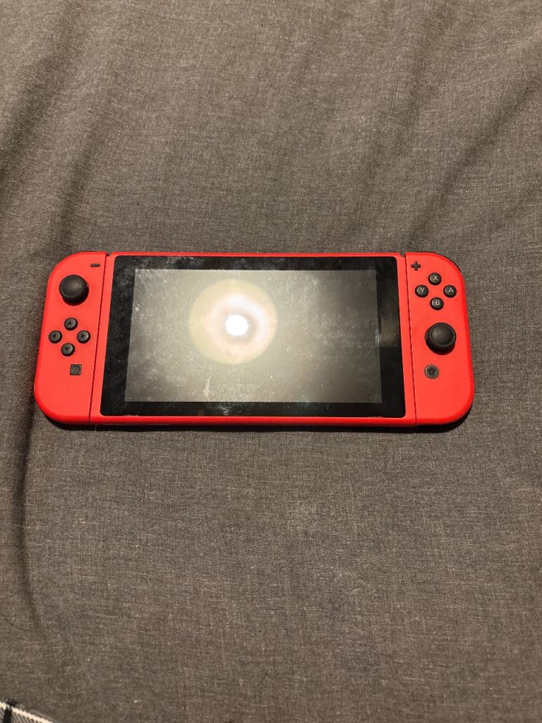 Nintendo Switch Console with Red Joy-Cons – Good Condition