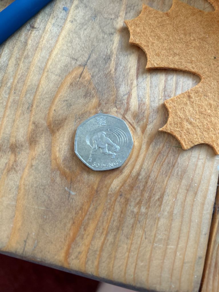 Various 50p and £2 coins some doubles