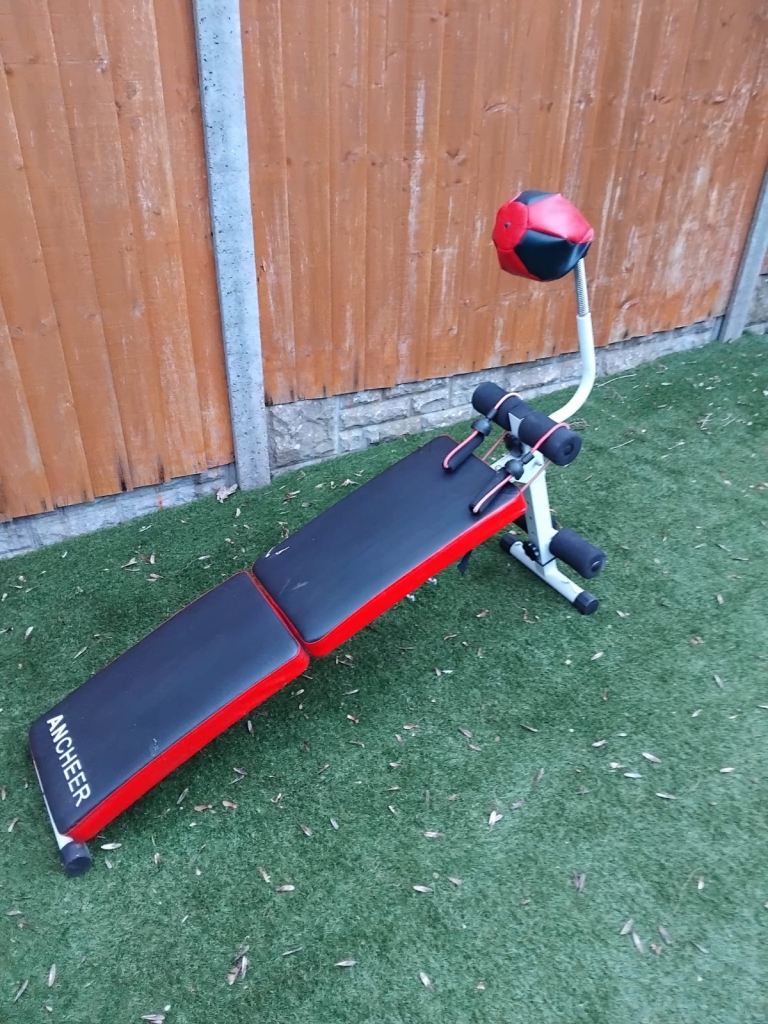 Exercise bench with punch ball