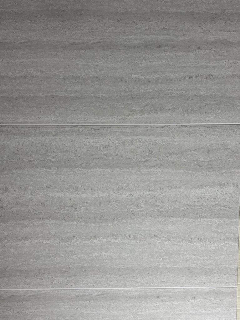 Grey tile effect wet wall 