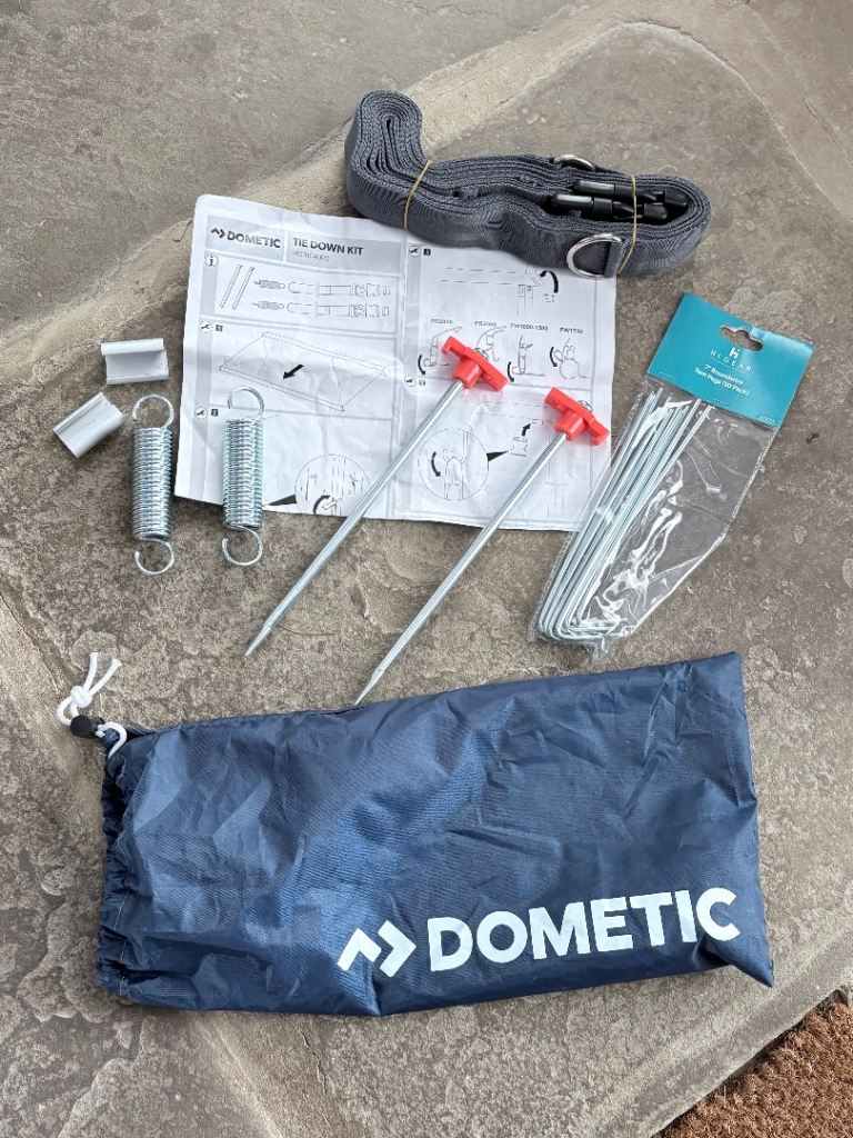Tie down kit for motorhome awnings.