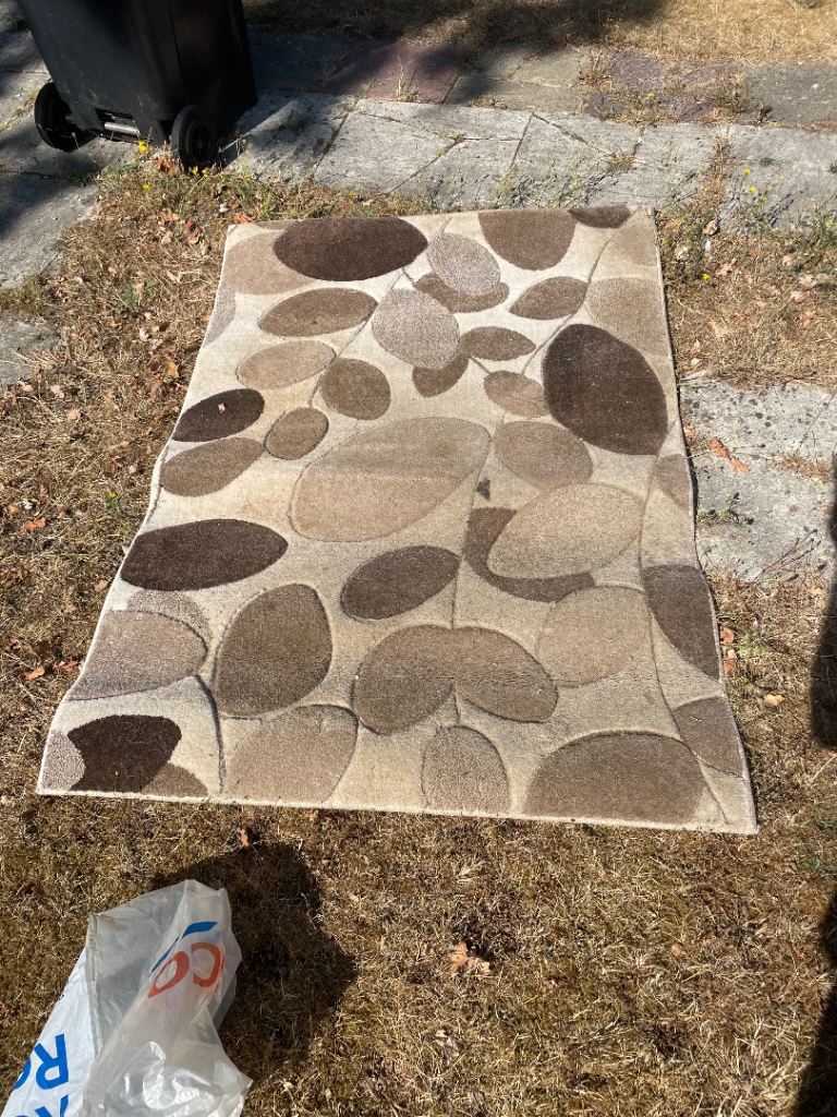 Carved Natural Leaf Rug Small - Brown Tones. Needs cleaning