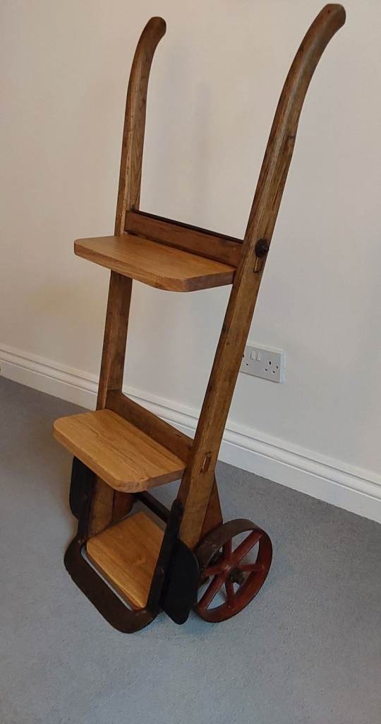 Handcrafted vintage barrow display unit 