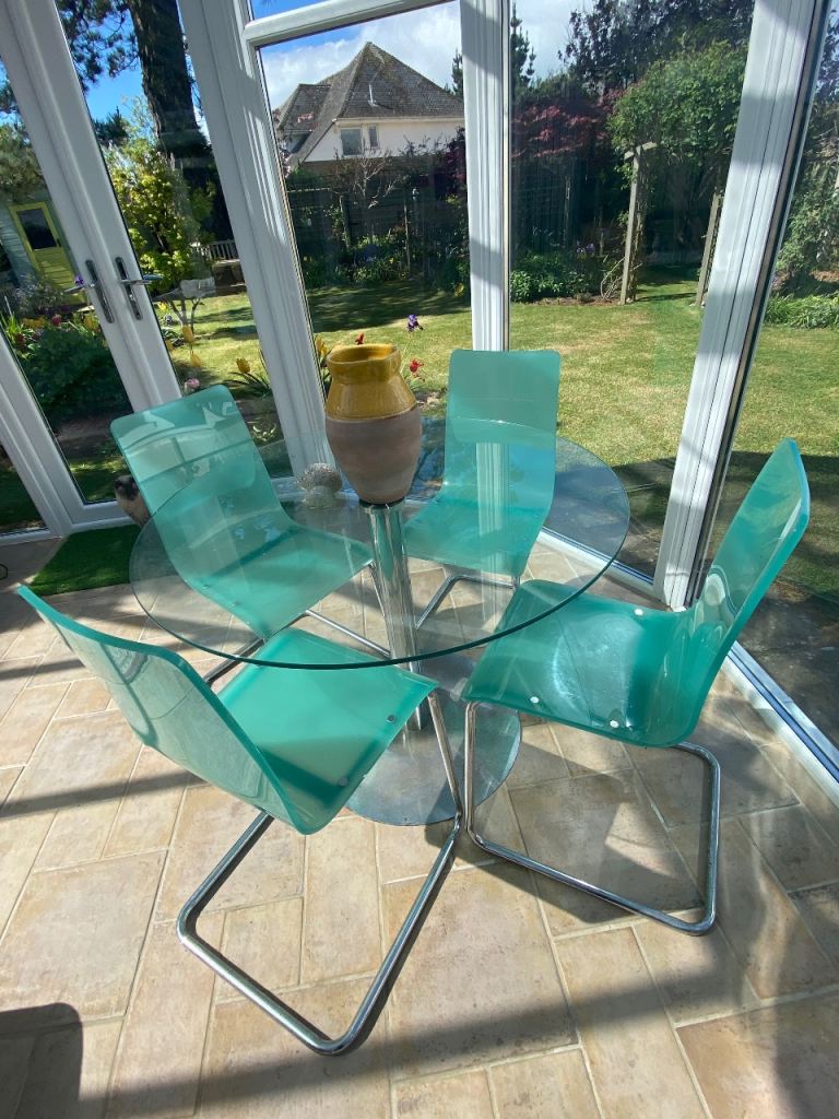 Glass Dining Table and 4 Green Perspex Chairs
