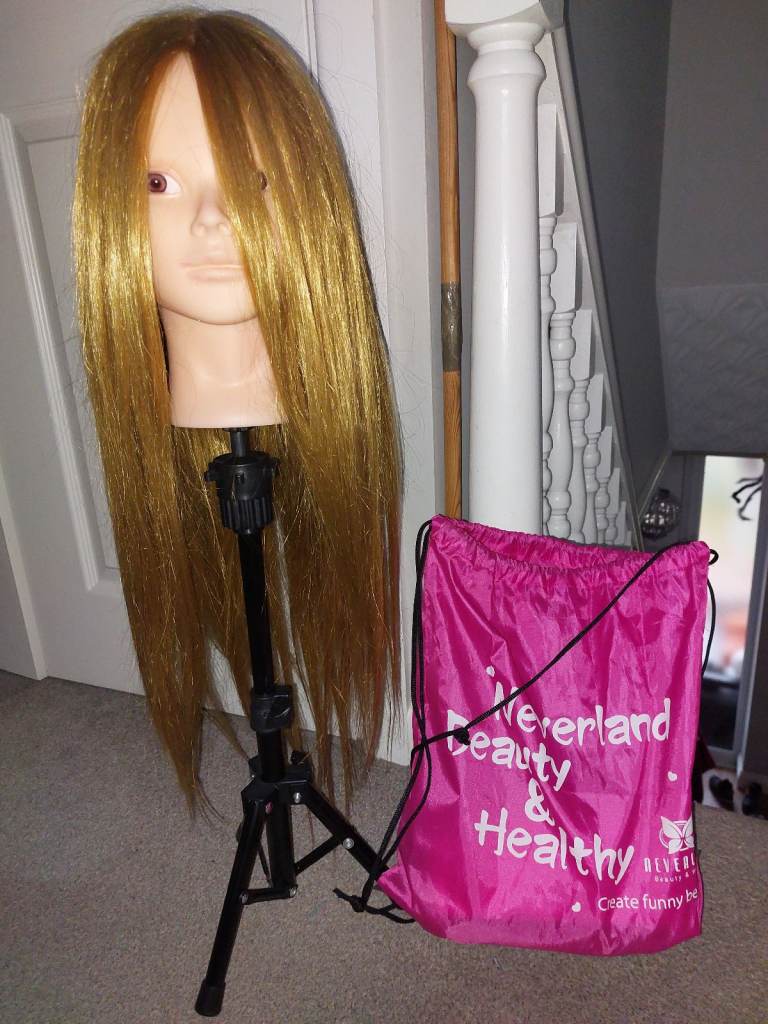 Hairdressers training head with stand