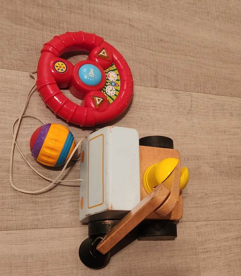 A bundle of Baby toys Red Steering Wheel Toy with sounds