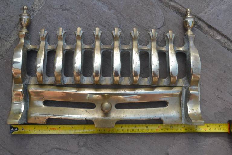 Brass fireplace grate