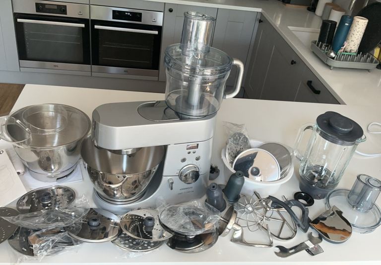 Kenwood Titanium stand mixer with lots of accessories 