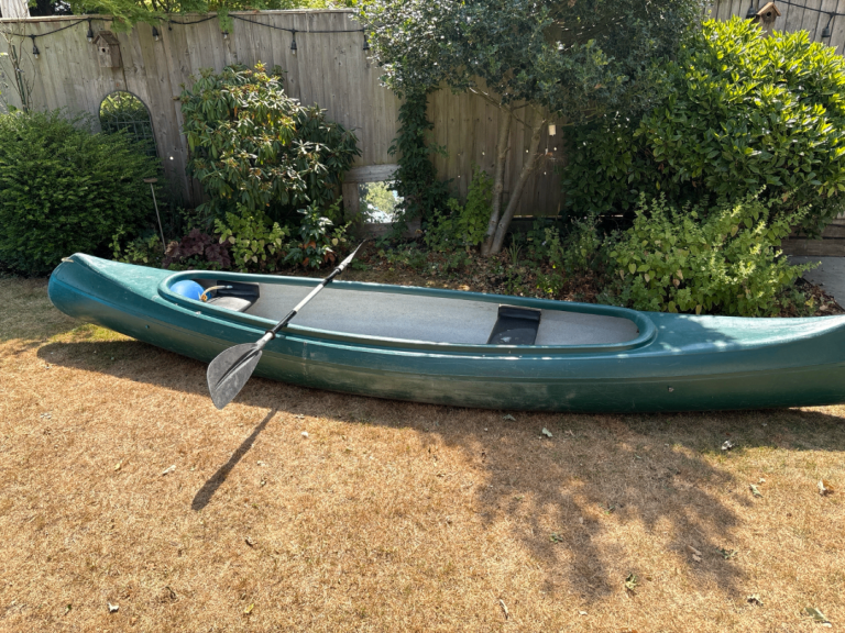 Green Kayak/Canoe with Paddle – Good Condition