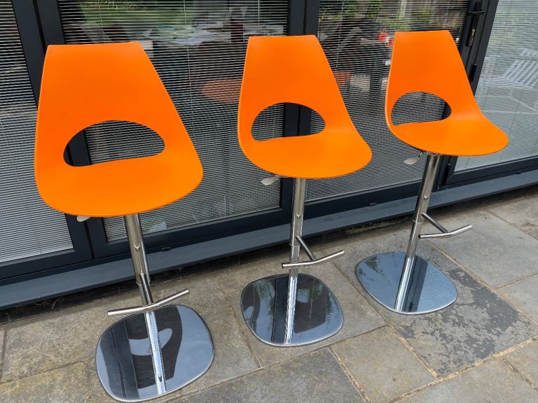 Set of 3 Orange Plastic Bar Stools with Chrome Bases