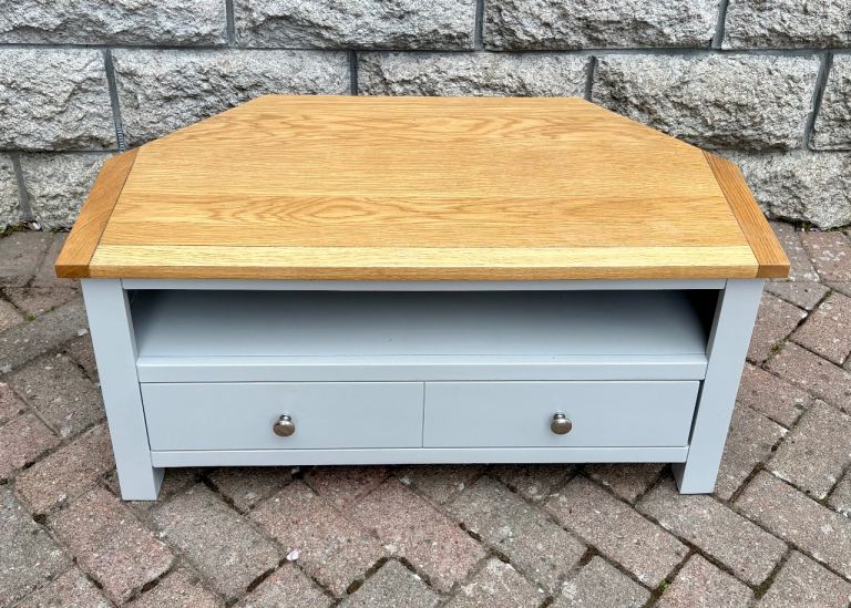 Corner TV stand with storage drawer