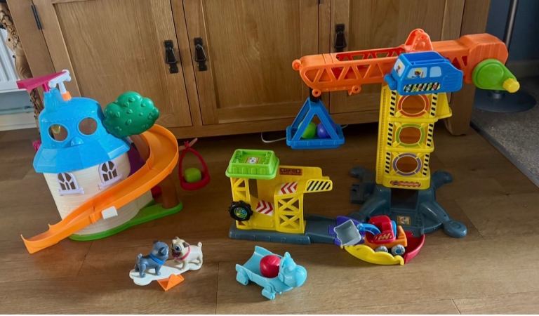 A fun puppy dog tales playhouse and construction site playset