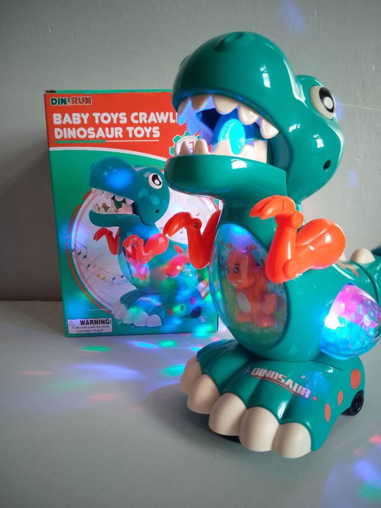 Musical dancing dinosaur with lights