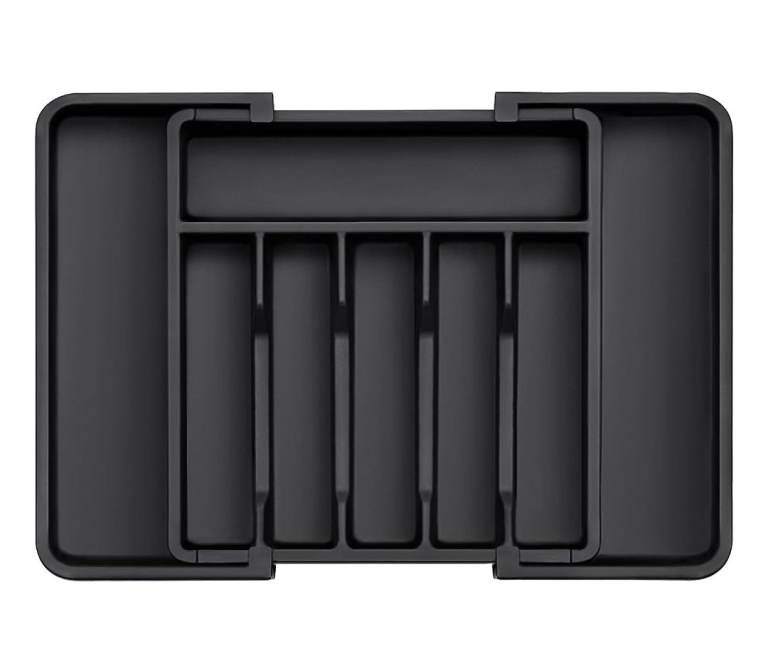 A new still packed black plastic cutlery drawer  