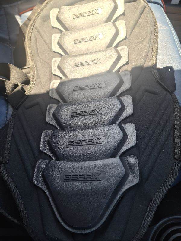Adjustable Gear X protective motorcycle vest covering the back/ spine.