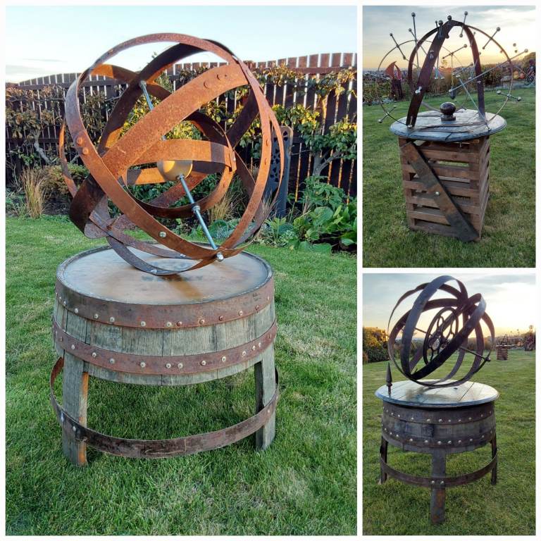 Handcrafted rustic garden art.  Created from recycled whisky barrel and other materials 