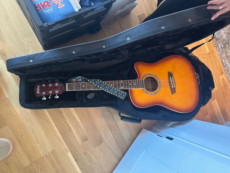 Acoustic Guitar with Hard Case and Strap – Good Condition