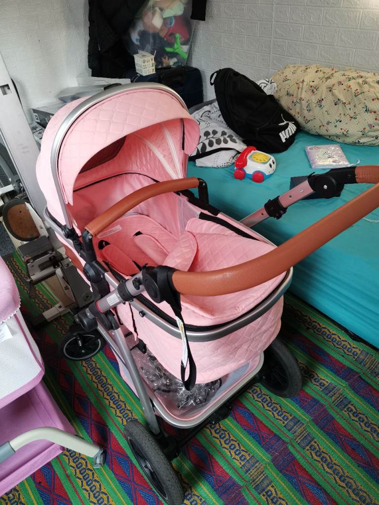 Lovely Pink Baby Pram / Pushchair  Pink car seat and Pink Cot/Cradle in Excellent condition 