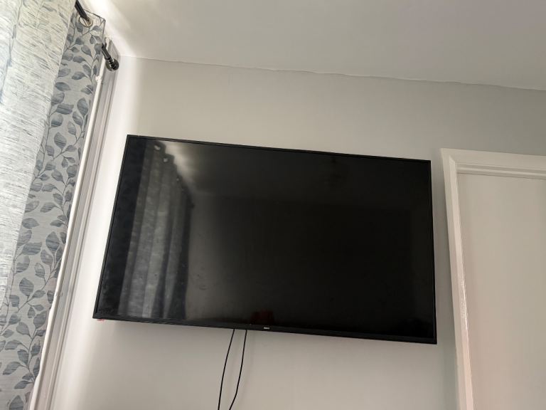Black Flat Screen TV – Good Condition