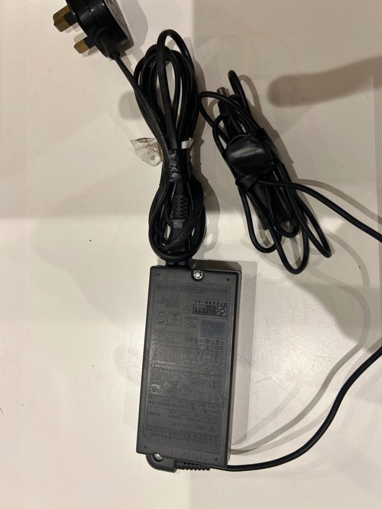 image for Cannon charger adapter 