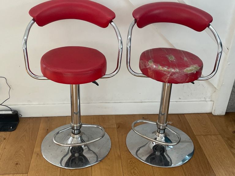 Pair of Red Swivel Bar Stools with Arms