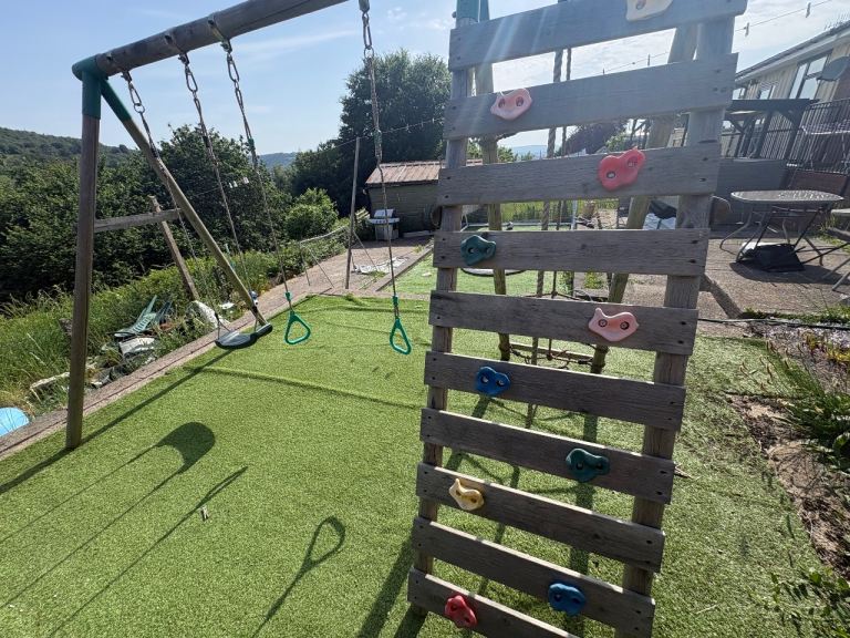 Climbing frame and swings