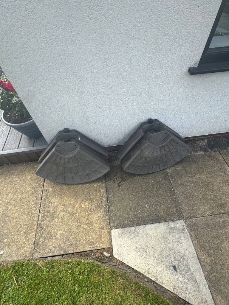 4 Grey Parasol Bases - Good Condition