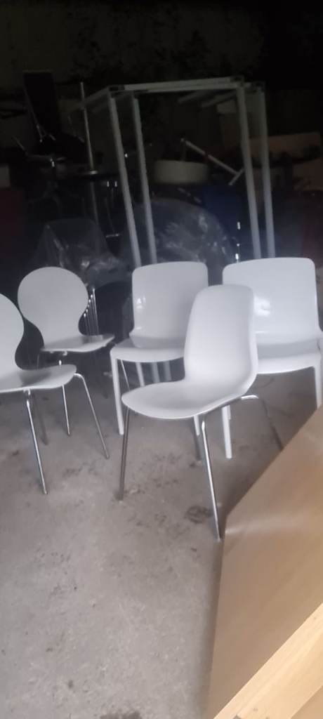 image for White plastic chairs
