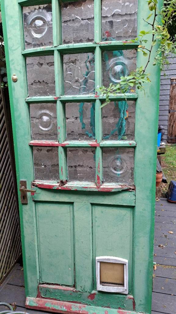 Vintage Wooden Door with Glass Panels and Cat Flap