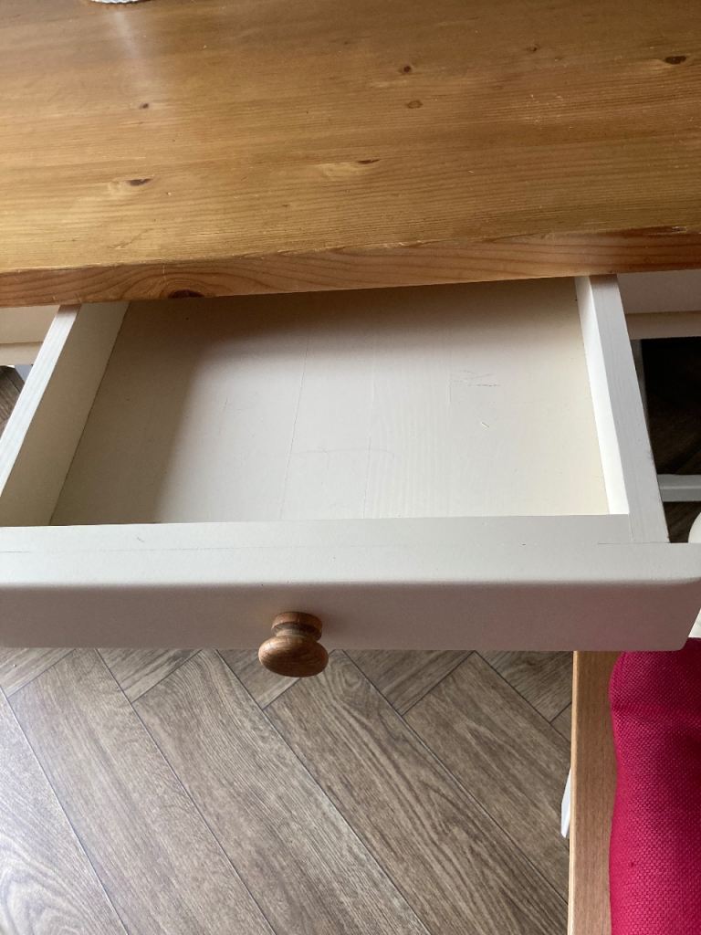  solid table with drawers and four chairs , cream legs /base -edging  