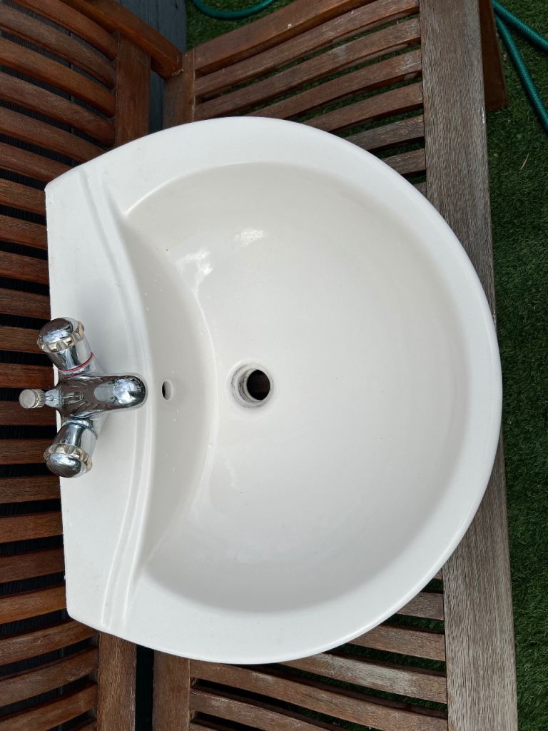 Bathroom sink and tap