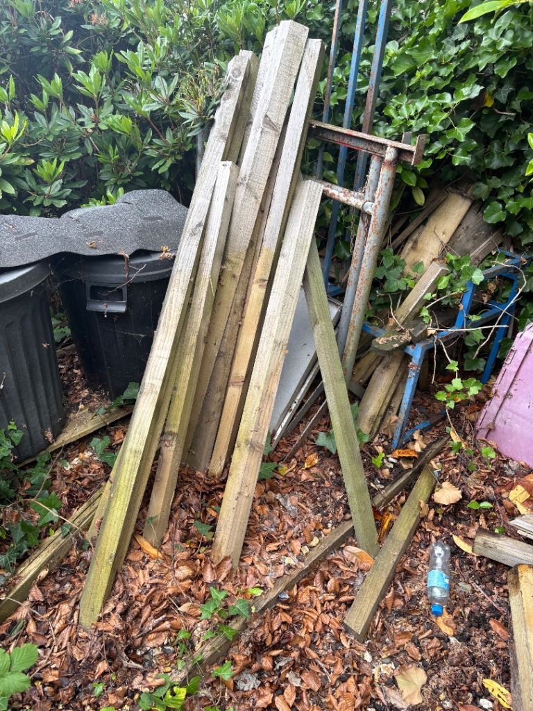 Free wood cant rail and short pieces of 4” post