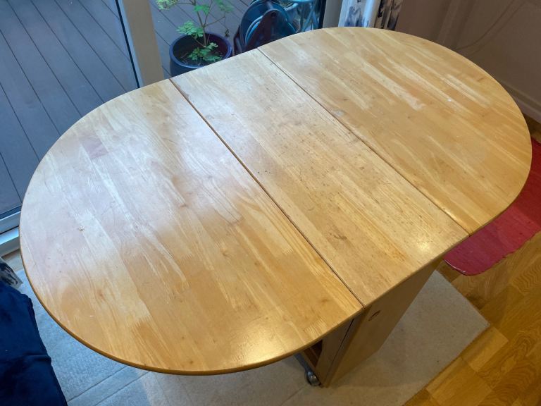 Fold away dining or kitchen table with four fold away chairs