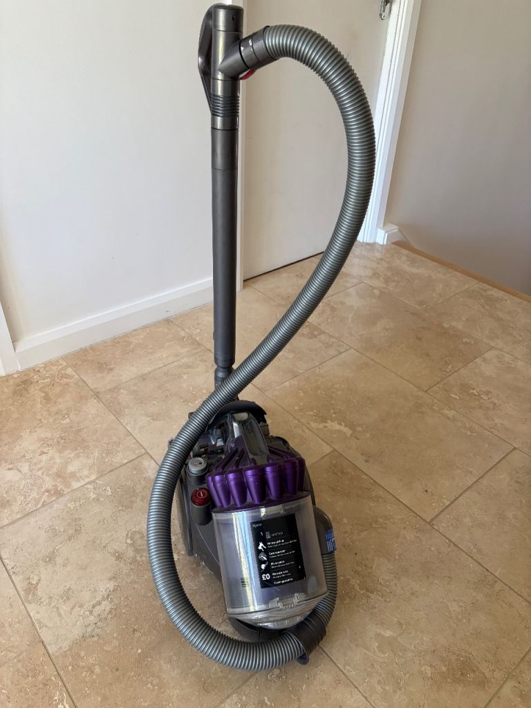 Dyson Vacuum Cleaner – Purple, Good Condition
