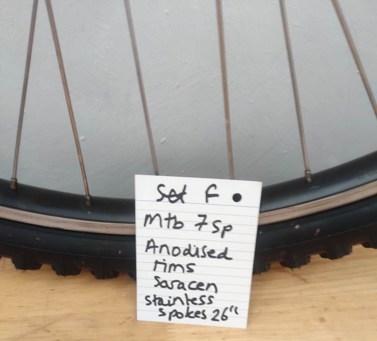 Mountain bike wheel set with tyres 7sp Saracen super hard anodised rims